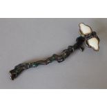 A bronze ruyi sceptre. 27 cm long.
