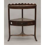 A 19th century mahogany corner washstand. 59 cm wide.