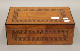 A Victorian inlaid walnut box. 32.5 cm wide.