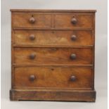 A Victorian mahogany chest of drawers. 98.5 cm wide.