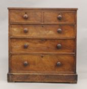 A Victorian mahogany chest of drawers. 98.5 cm wide.