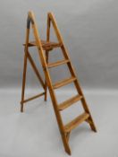 A vintage folding step ladder. 155 cm high.