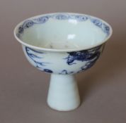 A Chinese blue and white porcelain stem cup. 8.75 cm high.