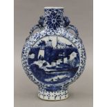 A 19th century Chinese blue and white porcelain moon flask. 21 cm high.