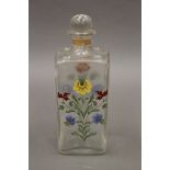 A 19th century Continental painted decanter. 20 cm high.