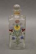 A 19th century Continental painted decanter. 20 cm high.