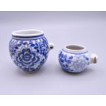 Two Chinese porcelain blue and white bird feeders. The largest 5.5 cm high.