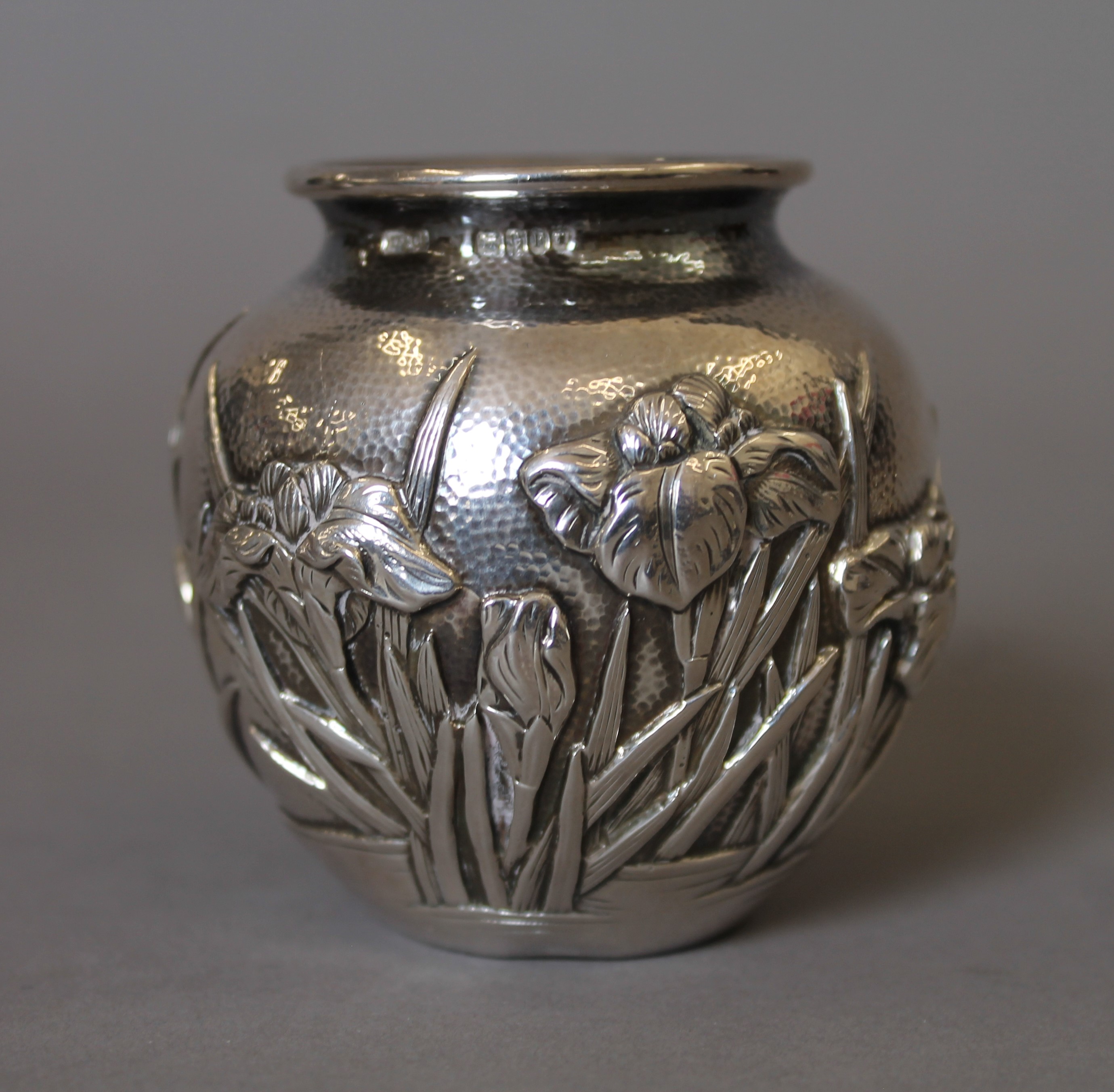 A pair of Japanese embossed silver vases, with Liberty & Co import marks. Each 6.5 cm high. 247. - Image 3 of 5