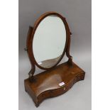 A 19th century mahogany three-drawer toilet mirror. 44.5 cm wide.