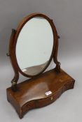 A 19th century mahogany three-drawer toilet mirror. 44.5 cm wide.