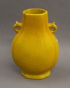 A 19th century Chinese yellow ground porcelain vase. 33 cm high.