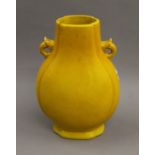 A 19th century Chinese yellow ground porcelain vase. 33 cm high.