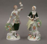 A pair of Sitzendorf porcelain figures. The largest 18 cm high.