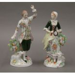 A pair of Sitzendorf porcelain figures. The largest 18 cm high.