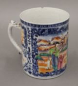 An 18th century Chinese Export tankard. 13 cm high.