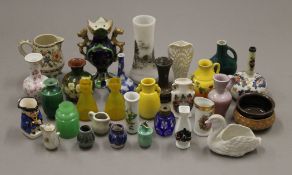 A quantity of various miniature vases, including Oriental.