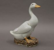 A Chinese pottery model of a goose. 21 cm high.