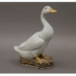 A Chinese pottery model of a goose. 21 cm high.