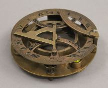 A brass sundial compass. 11 cm diameter.