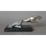 A Jaguar car mascot mounted on a plinth. 20 cm long overall.