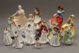 A quantity of Royal Doulton and other figurines.