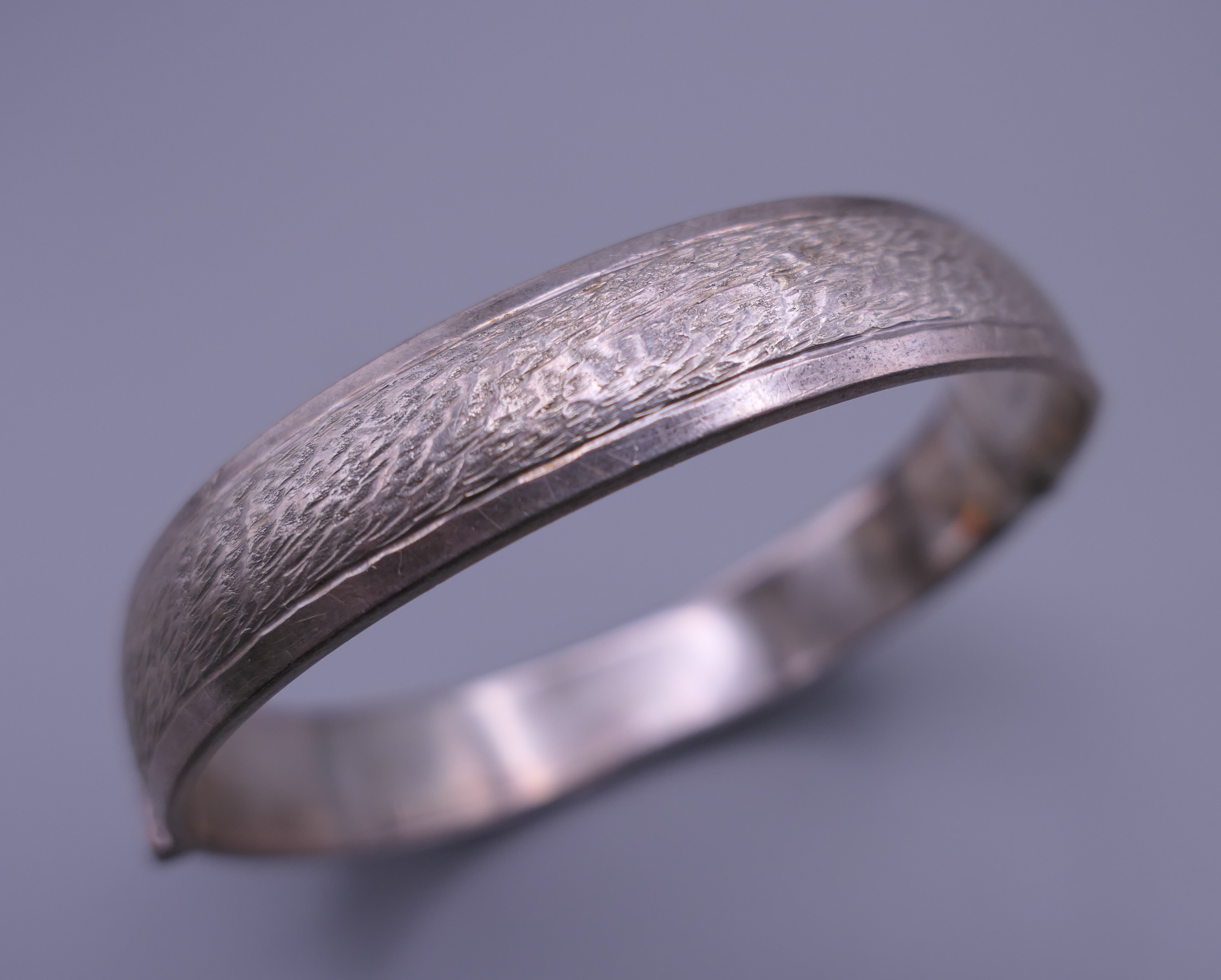 Three silver Christening bangles. The largest 6.5 cm diameter. 37.7 grammes. - Image 6 of 10