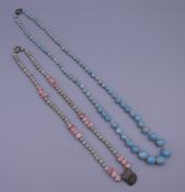 Two strings of turquoise beads. 74 cm long and 57.5 cm long respectively.