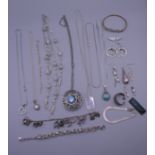 A bag of silver and white metal jewellery