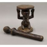 A small tribal wooden stool and a tribal fertility staff from the Congo. The former 18.5 cm high.