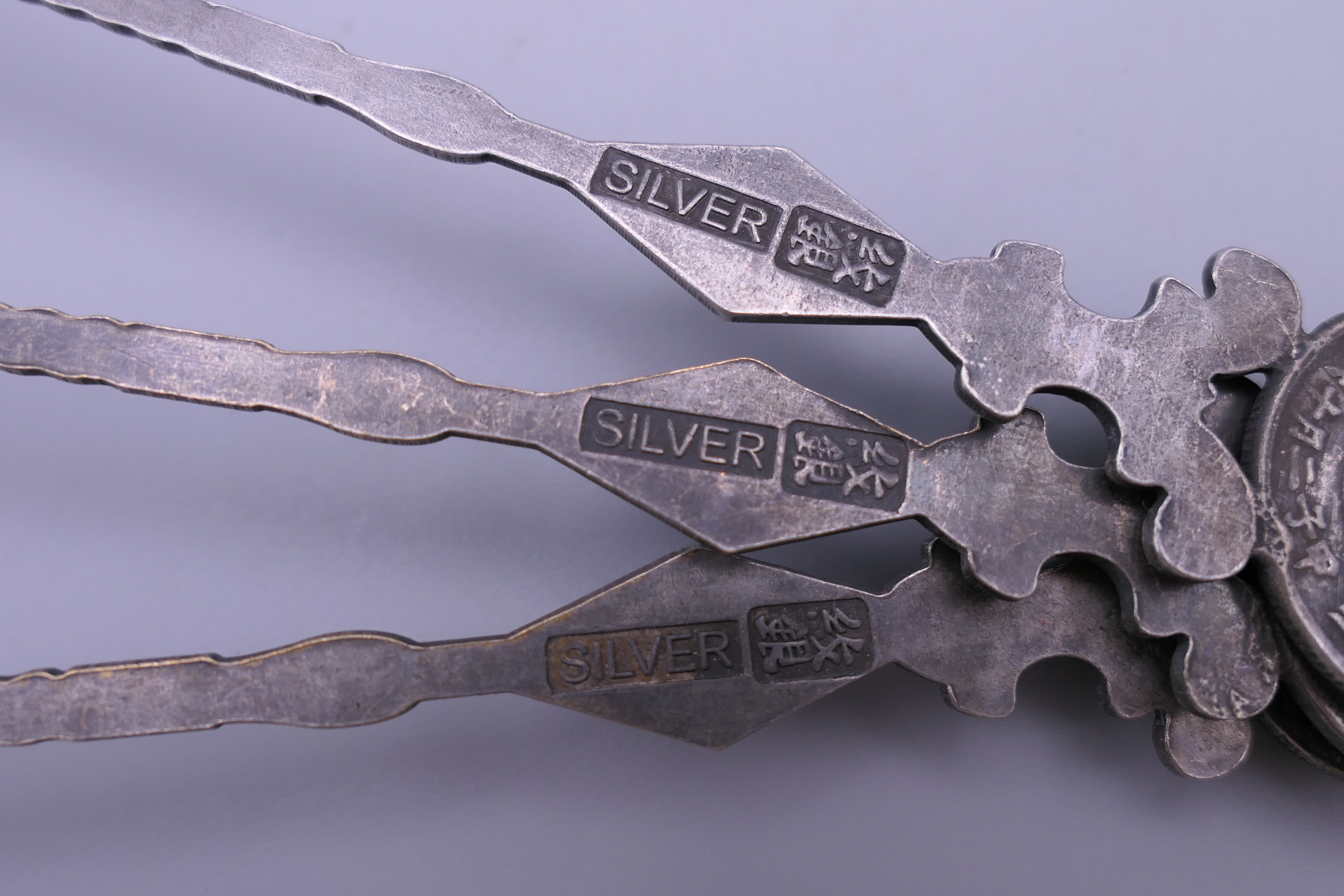 Six Chinese silver coin spoons. 17 cm long. - Image 9 of 11