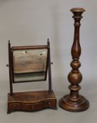 A 19th century mahogany three drawer toilet mirror and a stand. The former 43 cm wide.