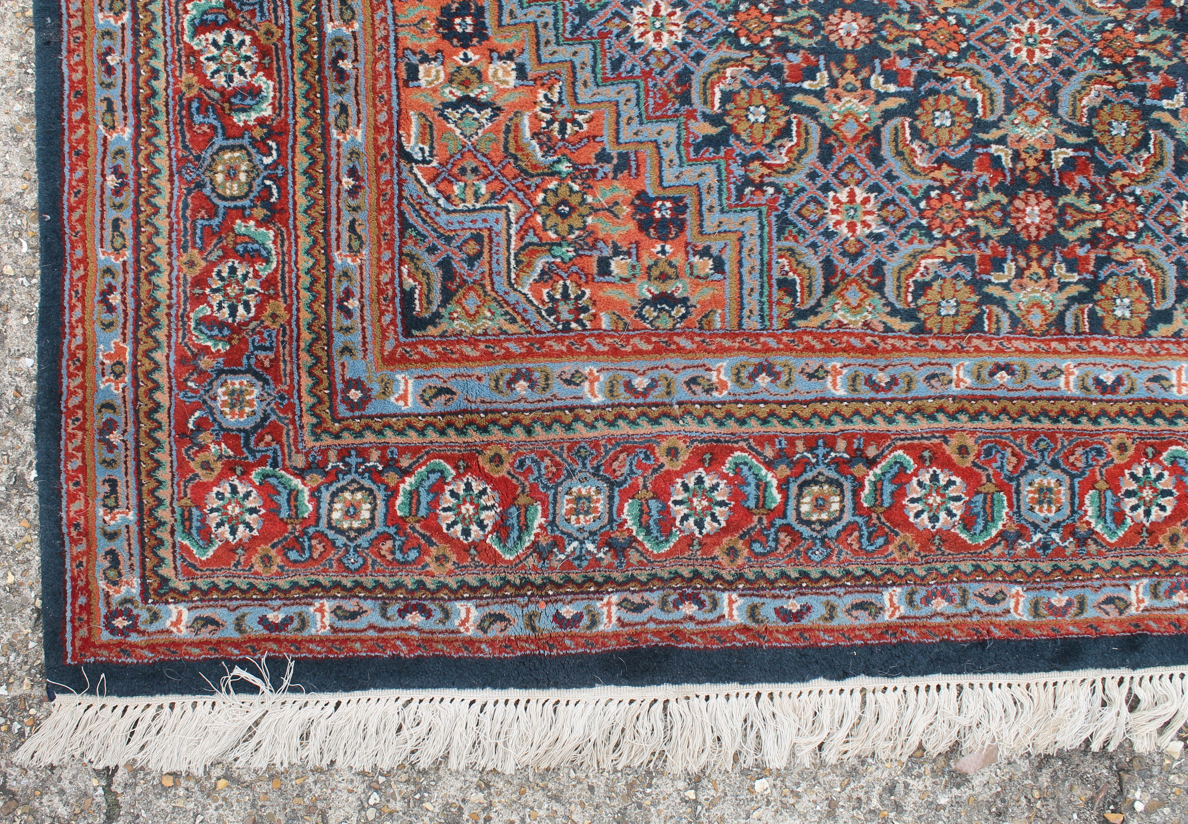 An Indian hand knotted wool rug. 233 x 169 cm. - Image 2 of 3