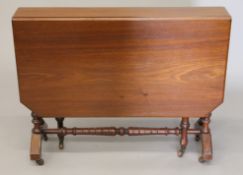 A Victorian walnut Sutherland table. 89.5 cm wide.