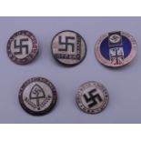 Five Nazi type badges. The largest 2.5 cm diameter.