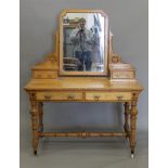 An Arts and Crafts inlaid ash dressing table, en-suite (see also the previous and next lots).