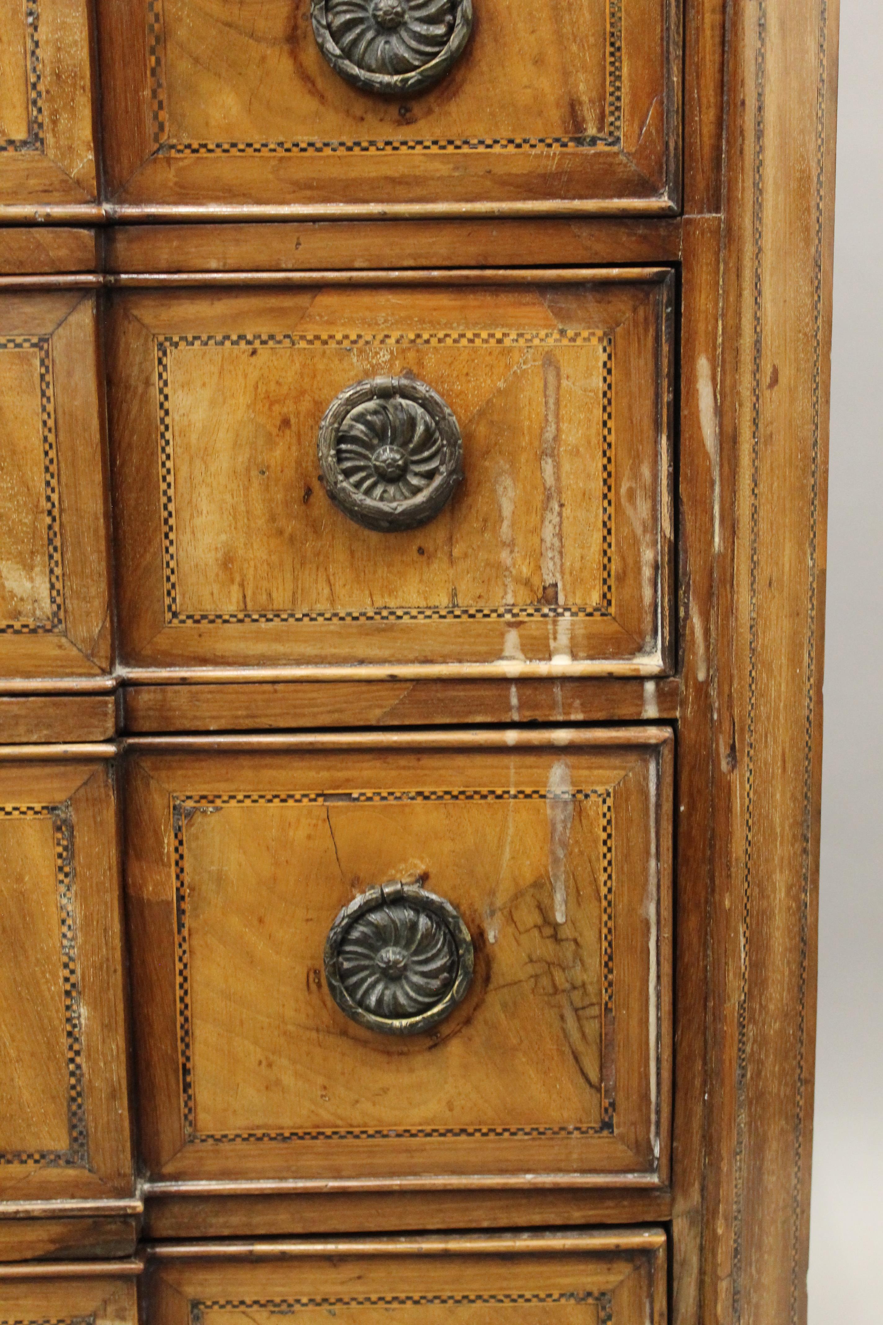 A 19th century inlaid mahogany breakfront chest of drawers. 96.5 cm wide. - Image 10 of 14
