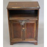 A mahogany side cabinet. 55.5 cm wide.