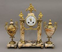 A marble and ormolu clock garniture with pendulum and key, with enamel dial and striking movement.