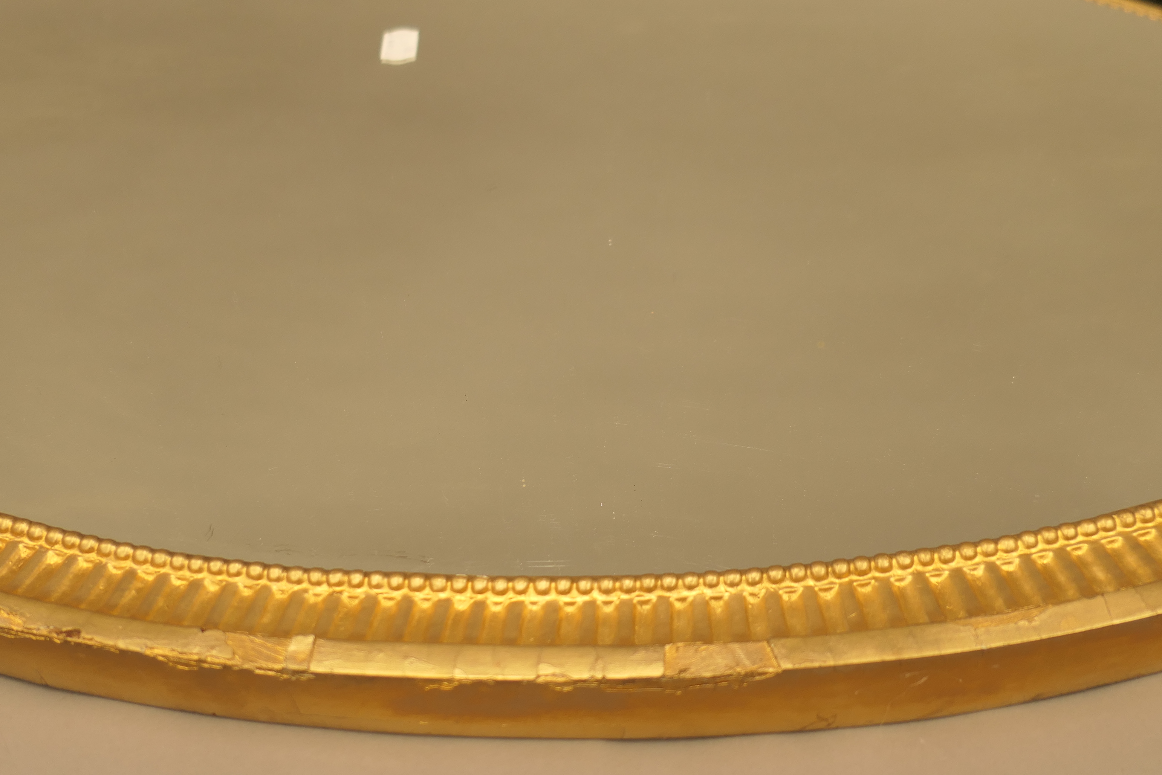 A 19th century oval gilt framed mirror. 90 cm wide, 53 cm high, 3.5 cm deep. - Image 10 of 10