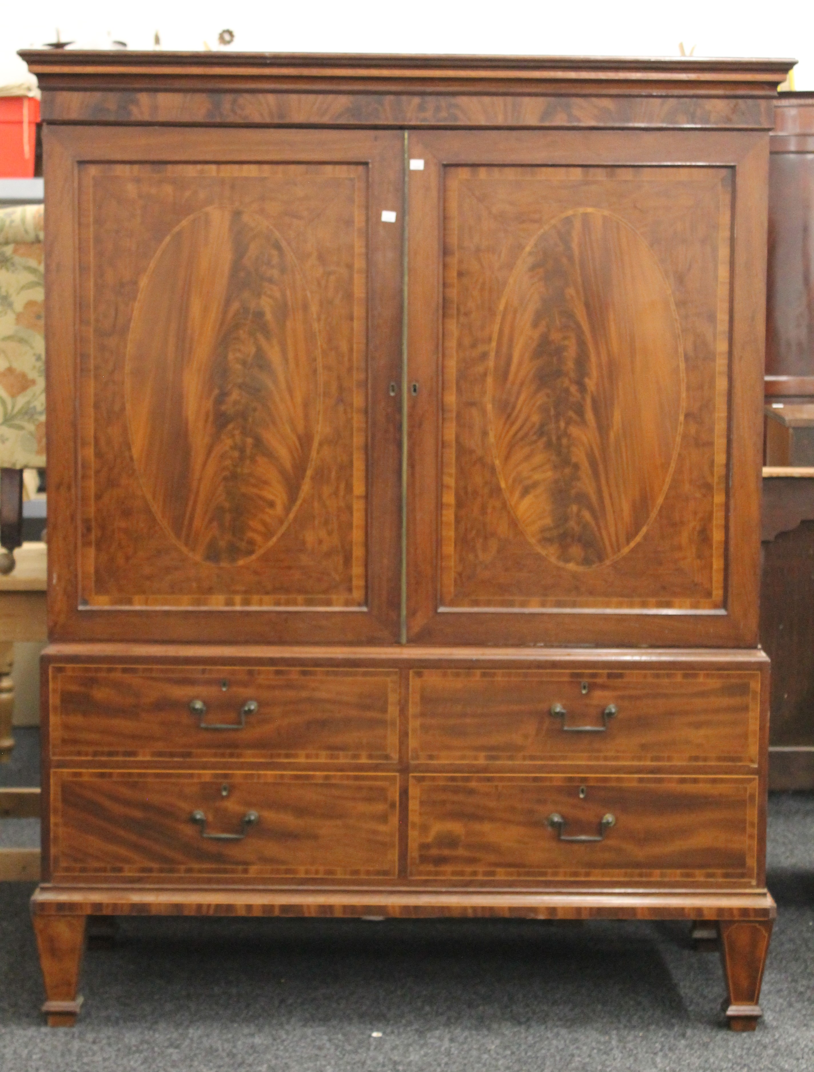 A 19th century mahogany linen press. 183 cm high x 142.5 cm wide.