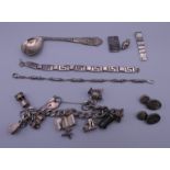 A quantity of silver, including a spoon, a pair of cufflinks,