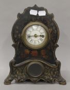 A 19th century toleware fronted clock. 29 cm high.