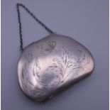 A Russian silver purse. 12 x 9.25 cm. 178.2 grammes total weight.