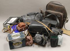 A quantity of miscellaneous camera equipment.