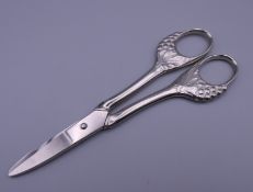 A pair of German Art Nouveau style grape scissors. 15.25 cm long.