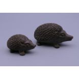 A pair of bronze hedgehogs. 5 cm long and 3.5 cm long.