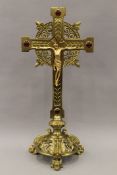 A 19th century brass crucifix. 51 cm high.