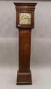 A Georgian oak longcase clock with silvered dial. 191.5 cm high.