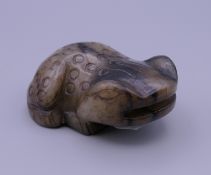 A Chinese jade frog. 7 cm long, 5 cm wide x 3 cm high.