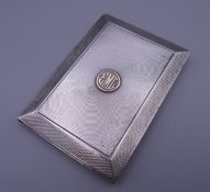 A silver cigarette case, hallmarked Asprey, London. 8.5 x 6 cm. 84.4 grammes total weight.